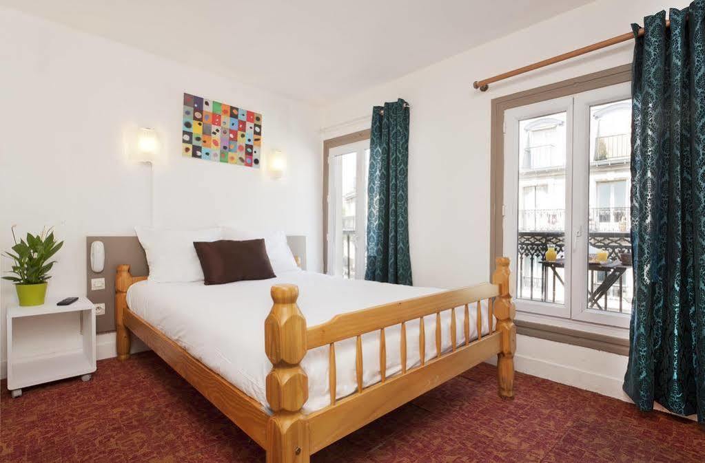 Hotel Petit Bastille Aulnay-sous-Bois Quarto foto